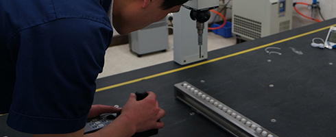 ASMPT's production staff using a CMM